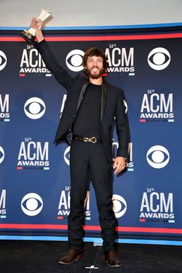Chris Janson celebrates first-ever ACM Award backstage Sunday night Photo credit: Getty Images/Courtesy of the Academy of Country Music